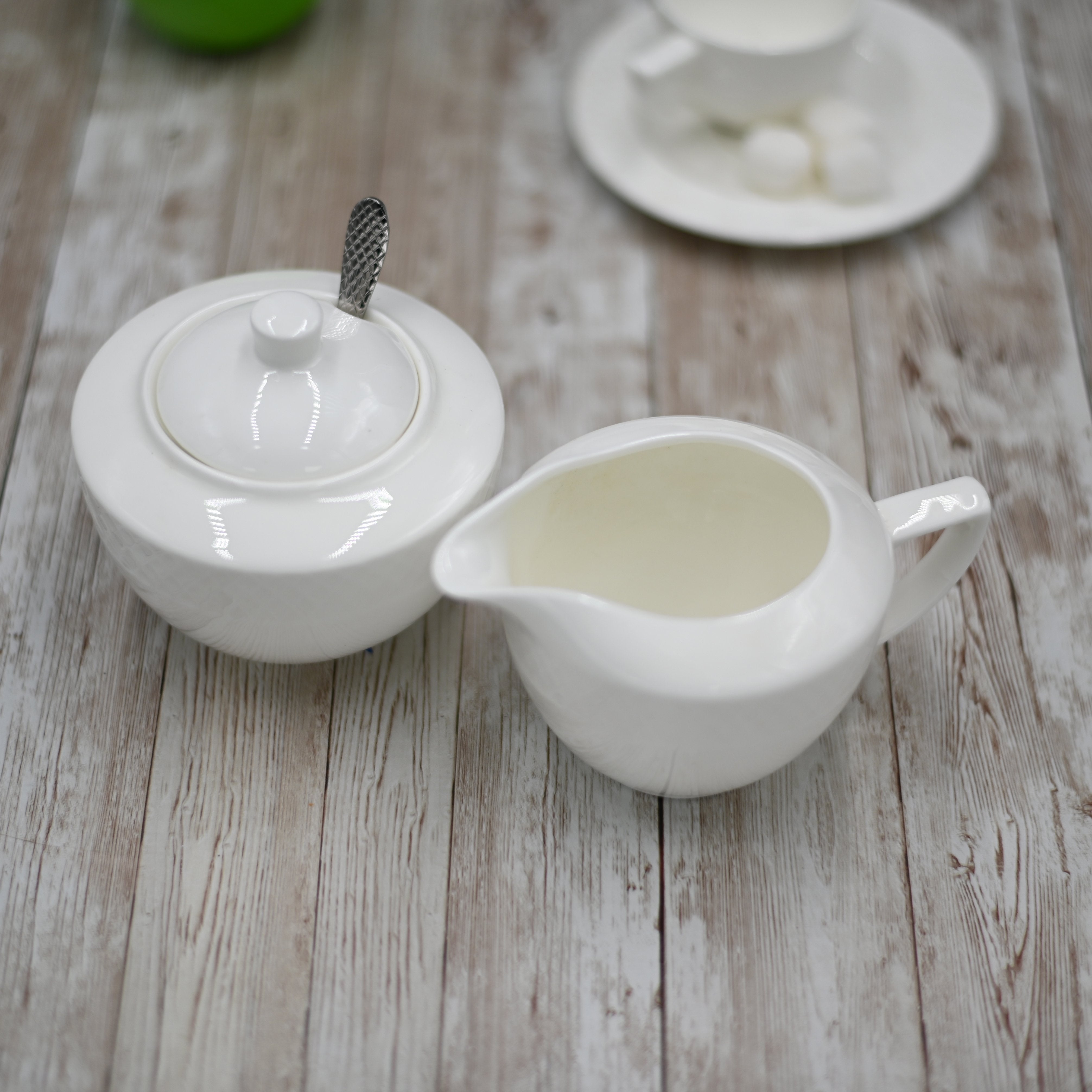Fine Porcelain Sugar Bowl and Creamer Set